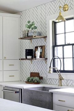 Neptune - There's no doubt that a neutral kitchen will stand the test of  time. And worry not, neutral never has to mean boring. A tiled splashback  in a herringbone design adds
