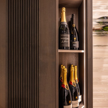 Custom Staircase Glass Wine Cellar & Display Cabinet in Newport Beach