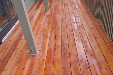 Deck - mid-sized traditional backyard ground level metal railing deck idea in San Francisco with a roof extension
