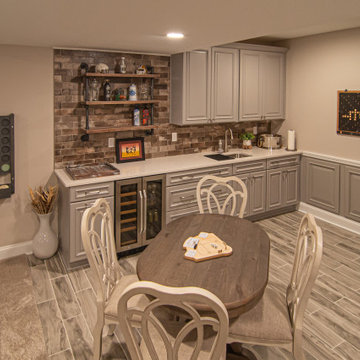 Basement With Entertainment Area for Family With Traditional Style Kitchenette