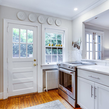 White Galley Kitchen with Hidden Toe Kick Drawers Washington DC