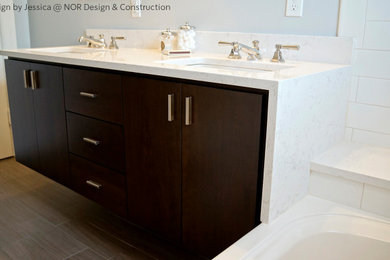 Example of a small minimalist green tile and ceramic tile bathroom design in Seattle with flat-panel cabinets, dark wood cabinets, an undermount sink, quartzite countertops and white countertops