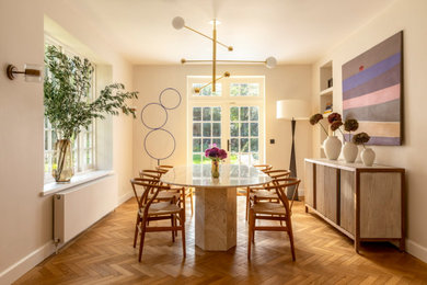 Design ideas for a contemporary dining room in London.