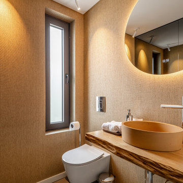 Powder room with backlit mirror and vessel basin, Alfragide