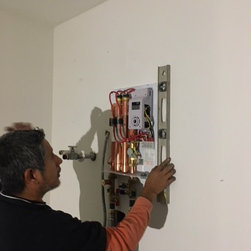 Tankless water Heater Install - Heating And Cooling