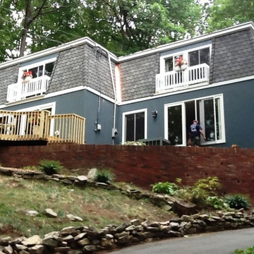 Mansard roof with copper trim and new siding