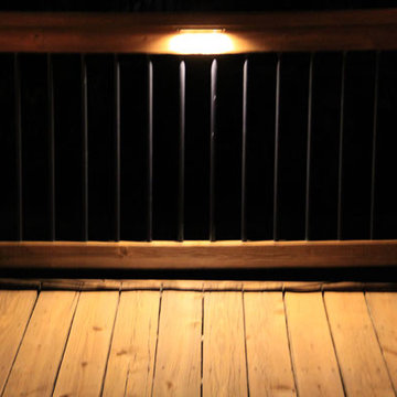 Deck lighting using low under railing LED lights