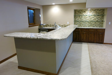 Inspiration for a contemporary ceramic tile basement remodel in Denver