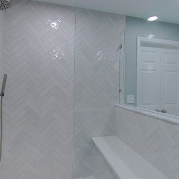 Modern Bathroom Remodel with Sleek Nickel Finishes and Hex Tile Details