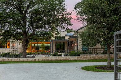 Inspiration for a transitional exterior home remodel in Dallas