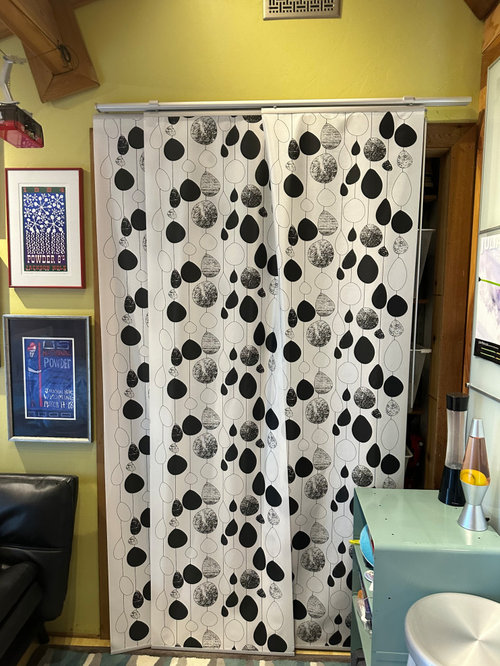 Sliding decorative fabric panels