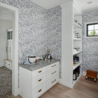 Large farmhouse kitchen pantry remodeling - Large farmhouse light wood floor and beige floor kitchen pantry photo in Phoenix with white cabinets, quartz countertops and gray countertops