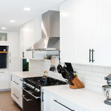 Rock Kitchen, Flooring and Custom Fireplace and Shelving Remodel