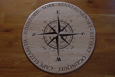 Compass rose side table with custom carving