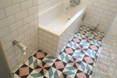 Metro tiles bathroom in Cheam