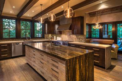 Open concept kitchen - large transitional u-shaped medium tone wood floor open concept kitchen idea in Sacramento with a farmhouse sink, flat-panel cabinets, dark wood cabinets, granite countertops, multicolored backsplash, mosaic tile backsplash, stainless steel appliances and an island