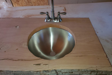 Bathroom - small rustic kids' double-sink bathroom idea in Phoenix with wood countertops