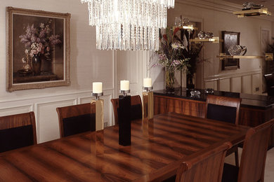 Enclosed dining room - large traditional carpeted enclosed dining room idea in Los Angeles with beige walls