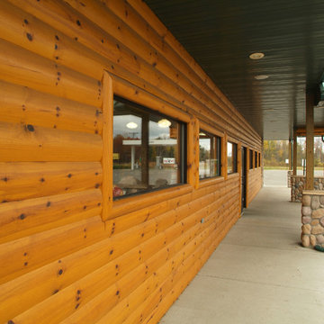Mix of quarter log siding and stone
