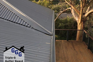 This is an example of a modern house exterior in Melbourne with a metal roof.