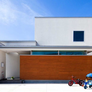 他の地域の北欧スタイルのおしゃれな家の外観 (混合材サイディング、片流れ屋根、戸建、金属屋根) の写真