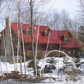 Ontario log homes with Hy-Grade's permanent steel roofing solution