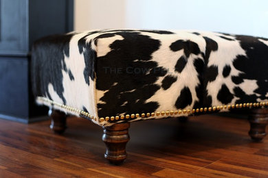 Cowhide Ottoman with Nailheads