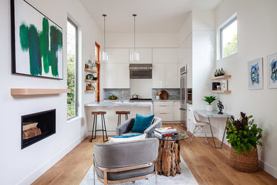 Inspiration for a small transitional living room in San Francisco with light hardwood floors.