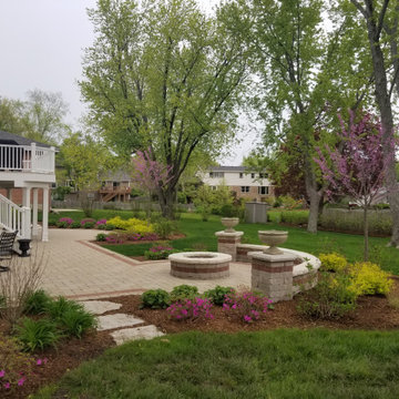 Palatine Unilock paver patio, gas fire pit, seat wall, landscape