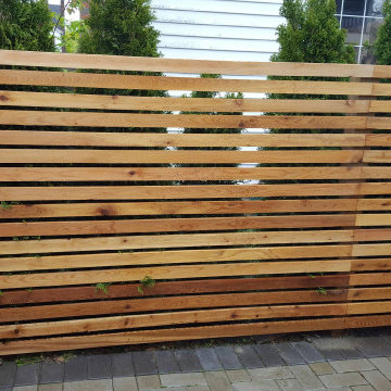 Custom cedar fence completed with pre stain