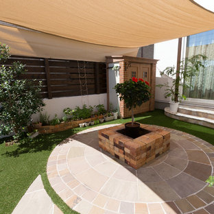 他の地域のアジアンスタイルのおしゃれなテラス・中庭 (オーニング・日よけ) の写真