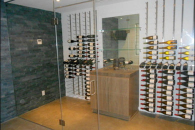 Inspiration for a mid-sized timeless wine cellar remodel in Las Vegas