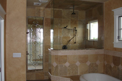 Example of a transitional bathroom design in Denver