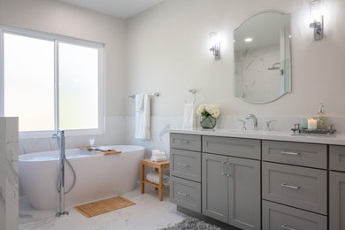 Example of a large transitional master black and white tile and porcelain tile porcelain tile and double-sink bathroom design in San Diego with shaker cabinets, gray cabinets, a bidet, an undermount sink, quartz countertops, a hinged shower door, white countertops and a built-in vanity