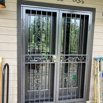 After /Adding Security With WIndow Guards & Security Storm Doors