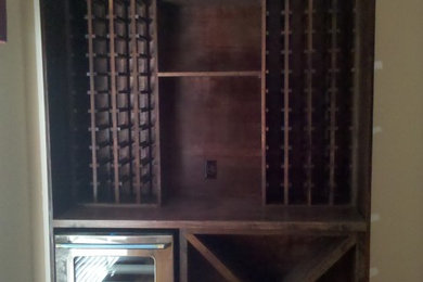 Wine cellar - traditional wine cellar idea in Charlotte