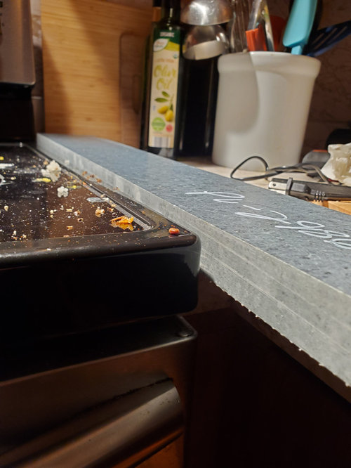 Soapstone countertops install on top of existing?