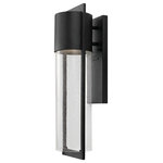 HInkley - Hinkley Shelter Medium Wall Mount Lantern, Black - Shelter's minimalist style in aluminum creates a chic, dramatic statement as the light from above grazes through its clear seedy glass. Shelter comes standard Dark Sky compliant.