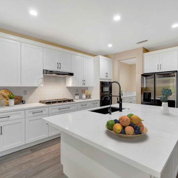 Bright White Kitchen Remodel with Large Quartz Island