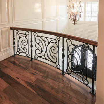 Project #74 | Circular Staircase with Hand-Forged Metal Panels