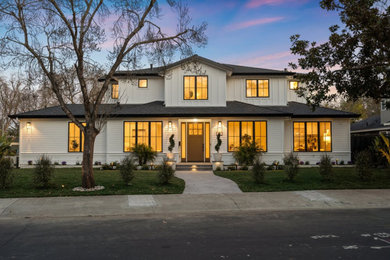 Large arts and crafts white two-story concrete fiberboard and board and batten exterior home photo in San Francisco with a shingle roof and a gray roof