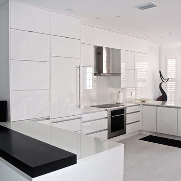High Gloss Acrylic Kitchen featuring Dekton Countertop