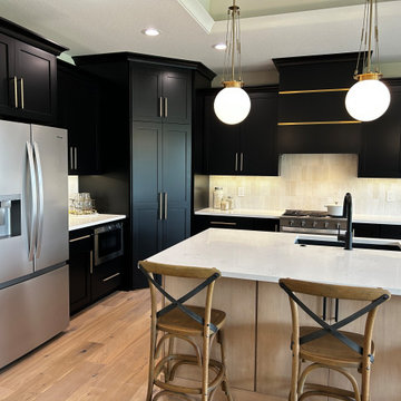 Black and Maple Wheat Kitchen with Brass Banded Hood