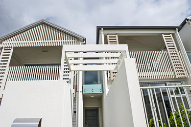 This is an example of a beach style exterior in Melbourne.