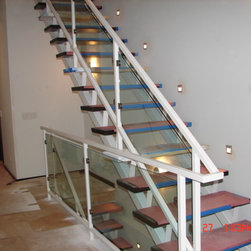 Steel stairs with glass panel - Products