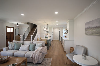 Farmhouse living room photo in Atlanta with a standard fireplace