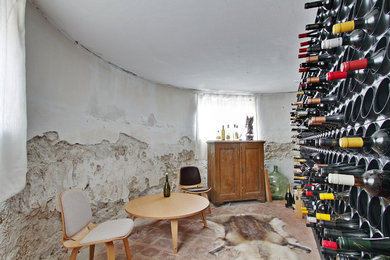 Wine cellar - small rustic wine cellar idea in Copenhagen