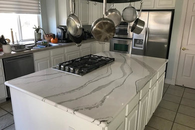 Kitchen - transitional kitchen idea in Other