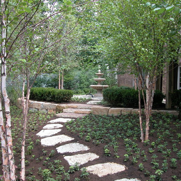 Progress shot of pachysandra stepping stone walkway to fountain