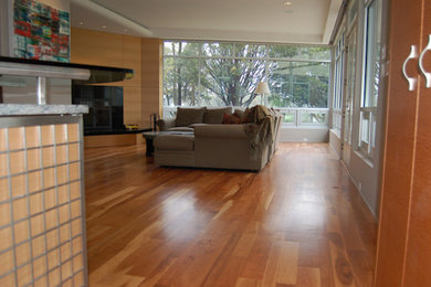 Design ideas for a living room in Philadelphia with medium hardwood floors.